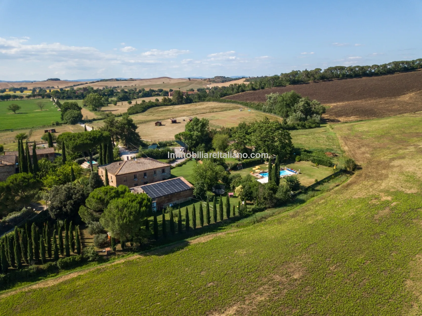 Tuscan Farmhouse with Agritourism Potential near Siena - Image 1