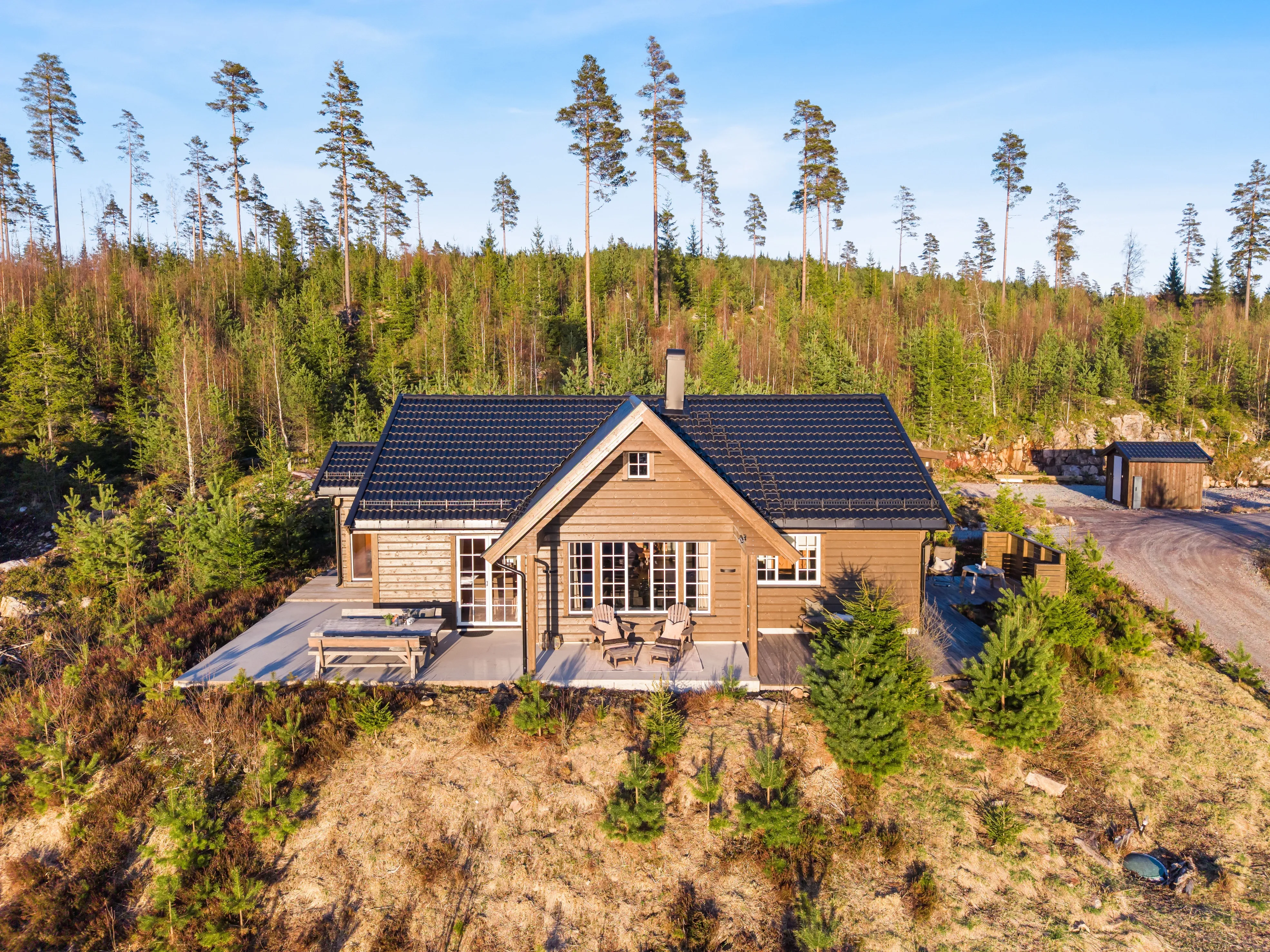 Contemporary 3-Bedroom Cabin with Expansive Terrace in Norway's Tranquil Rømskog - View image 6 of 41