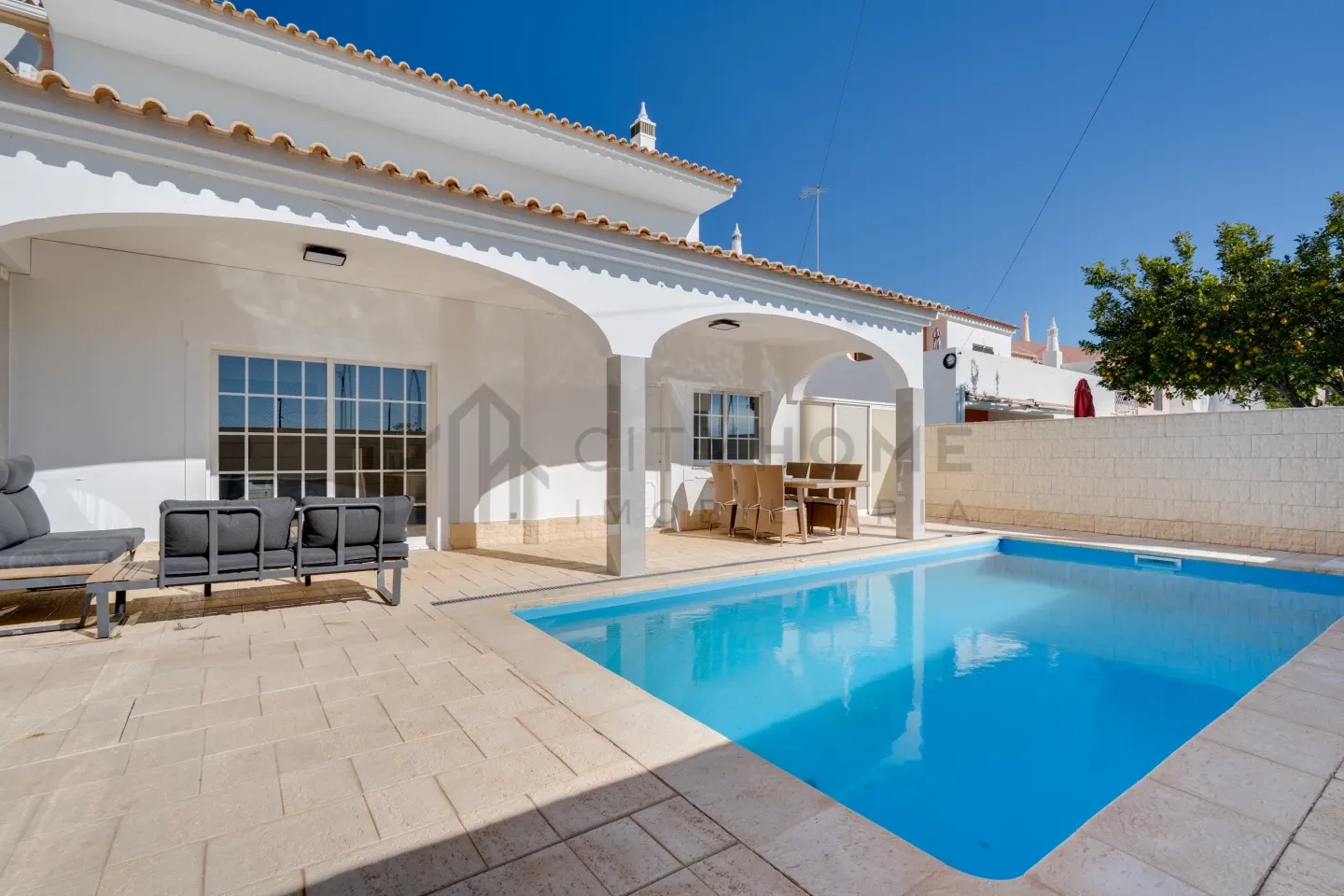 Modern 3-Bedroom Villa with Pool and Terrace in Vibrant Lagoa, Portugal - Image 2