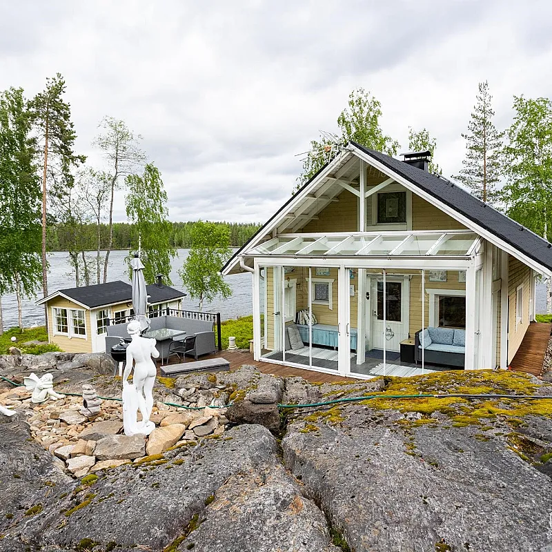 Finnish Lakeside Cabin with Expansive Grounds and Private Sauna