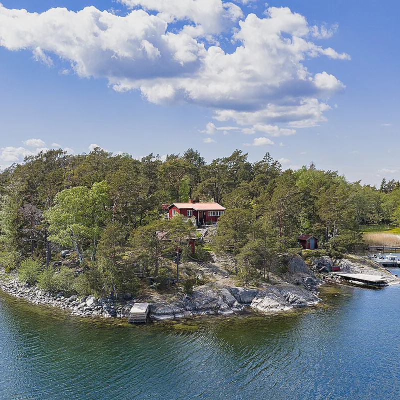 1960s Swedish Chalet on Expansive Island Lot with Garden and Parking