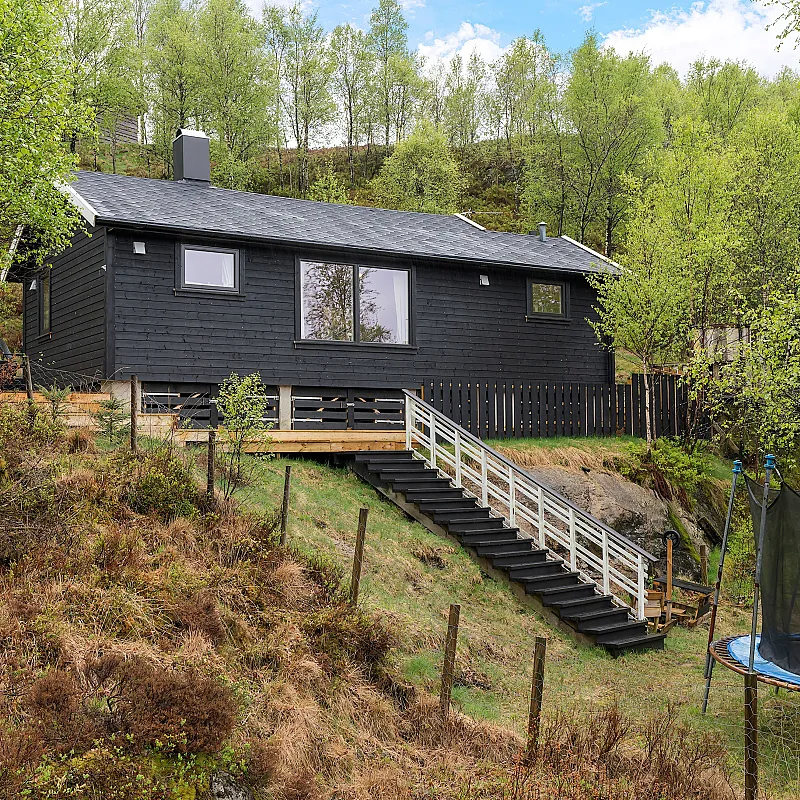 1970s Norwegian Cabin with Expansive Terrace and Garden in Bjerkreim