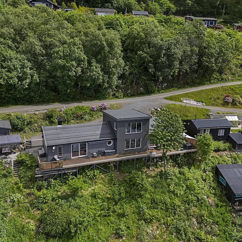 Norwegian Coast Cabin with Expansive Terrace and Sea Access