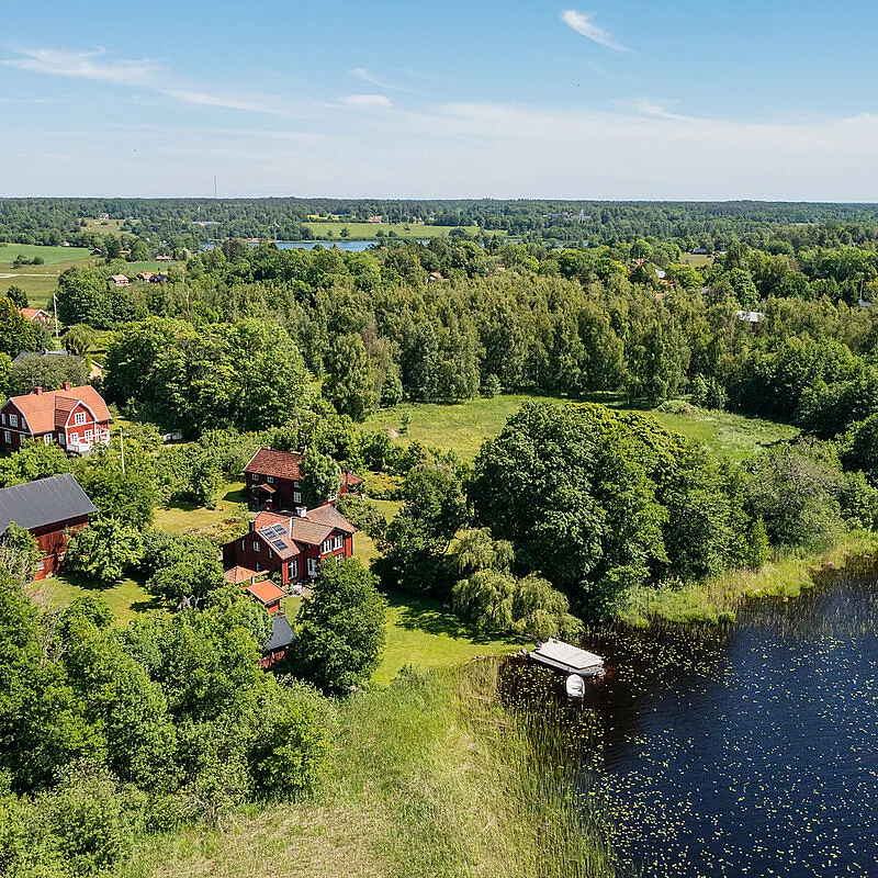 Historic 4-Bedroom Farmhouse with Expansive Land and Private Jetty in Väddö