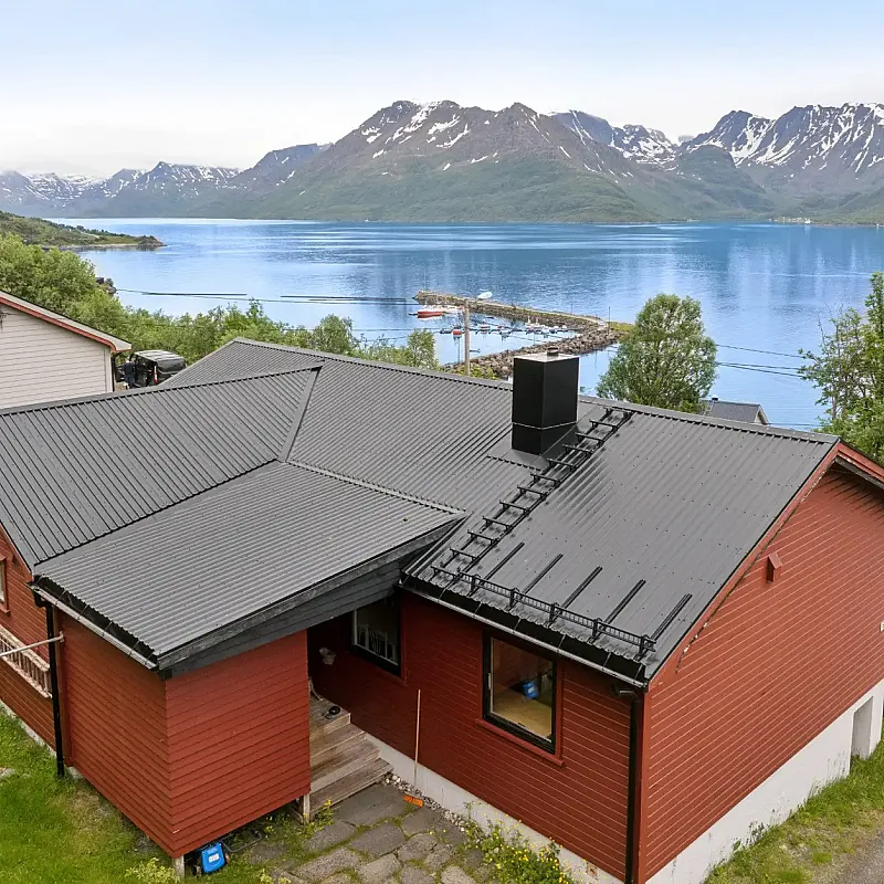 1960s Øksfjord House with Fjord Views: 4-Bedroom, Terrace, and Garage