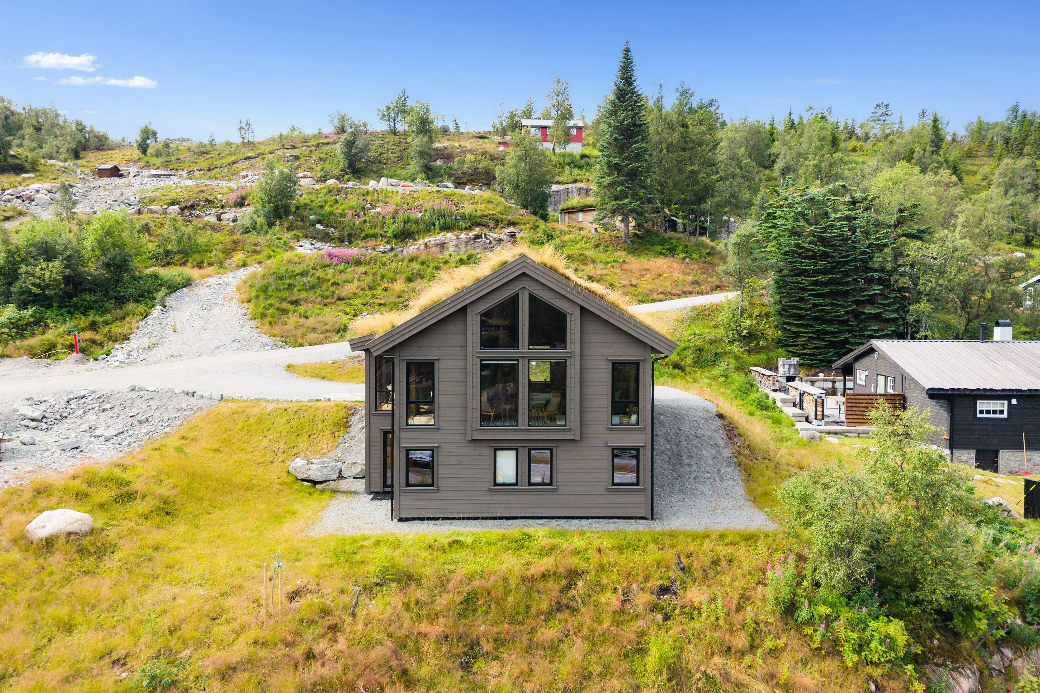 Modern Norwegian Home with Expansive Terrace in Scenic Sirdal - Image 1