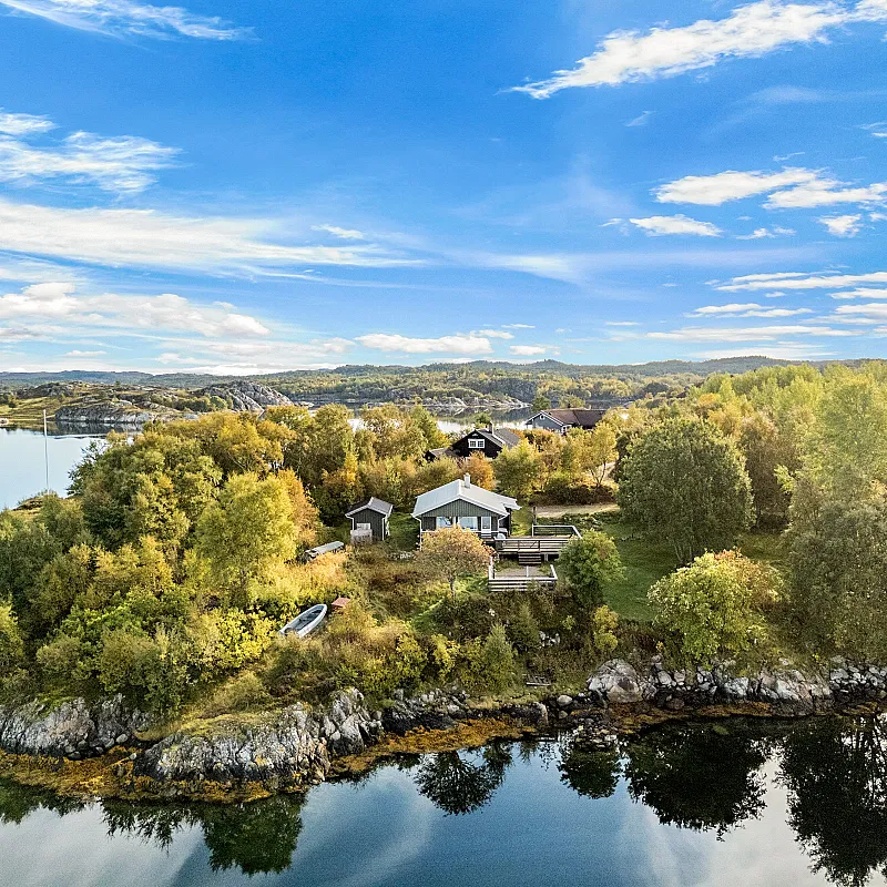 1970s Lakeside Cabin with Terrace and Dock in Hitra, Norway