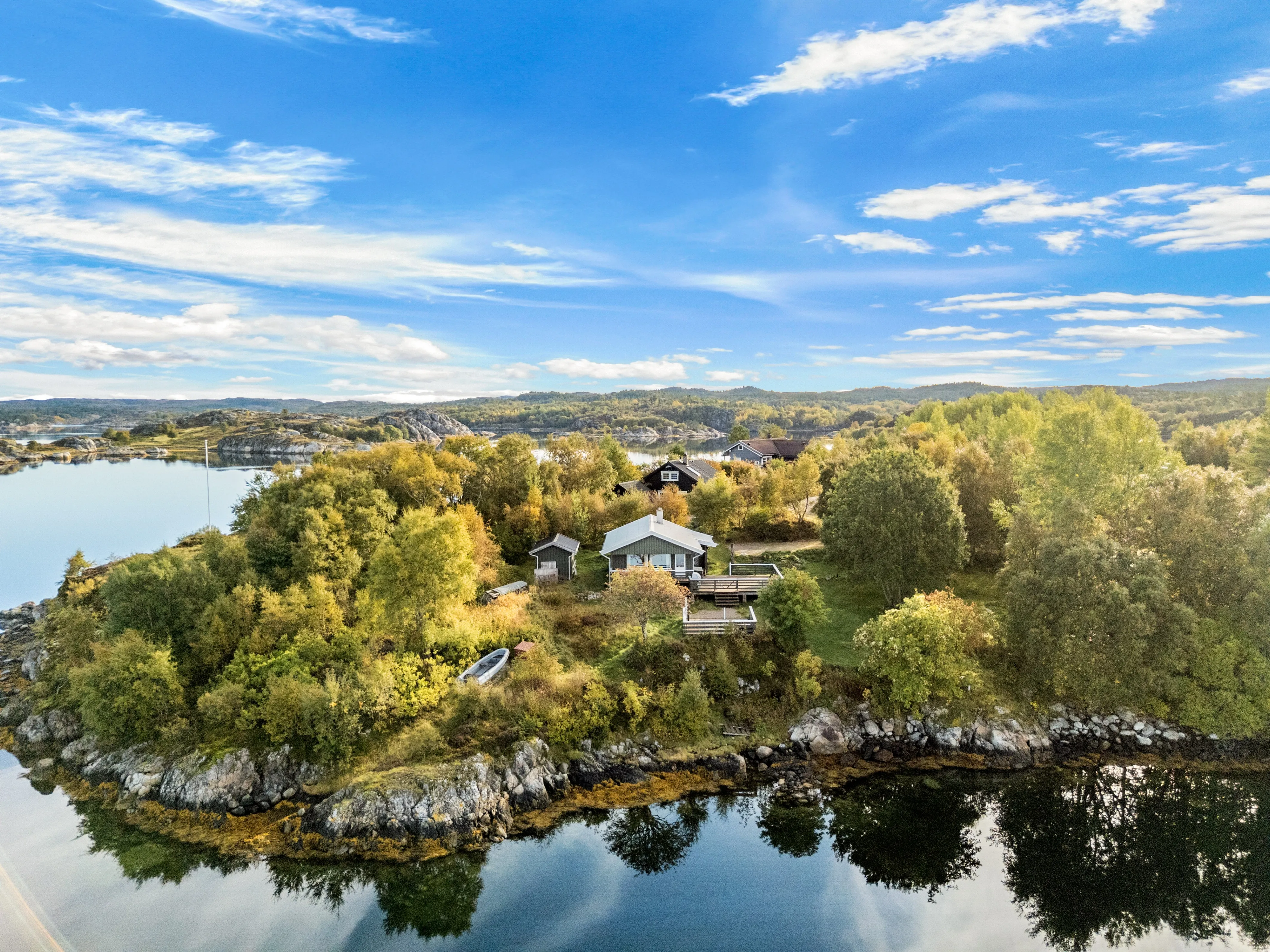 1970s Lakeside Cabin with Terrace and Dock in Hitra, Norway - Image 1