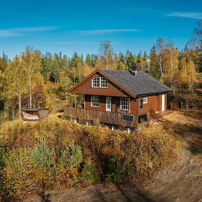 Modern Norwegian Cabin with Solar Power and Expansive Terrace